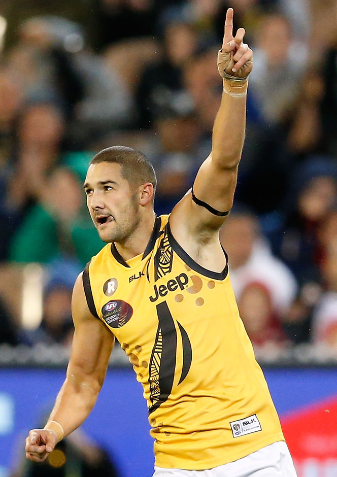 AFL 2016 Rd 10 - Essendon v Richmond MELBOURNE, AUSTRALIA - MAY 28: Shaun Grigg of the Tigers celebrates a goal during the 2016 AFL Round 10 Dreamtime at the G match between the Essendon Bombers and the Richmond Tigers at the Melbourne Cricket Ground on May 28, 2016 in Melbourne, Australia. (Photo by Adam Trafford/AFL Media)